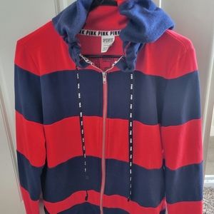 Pink Victoria jacket. Red and Blue with gold lettering.